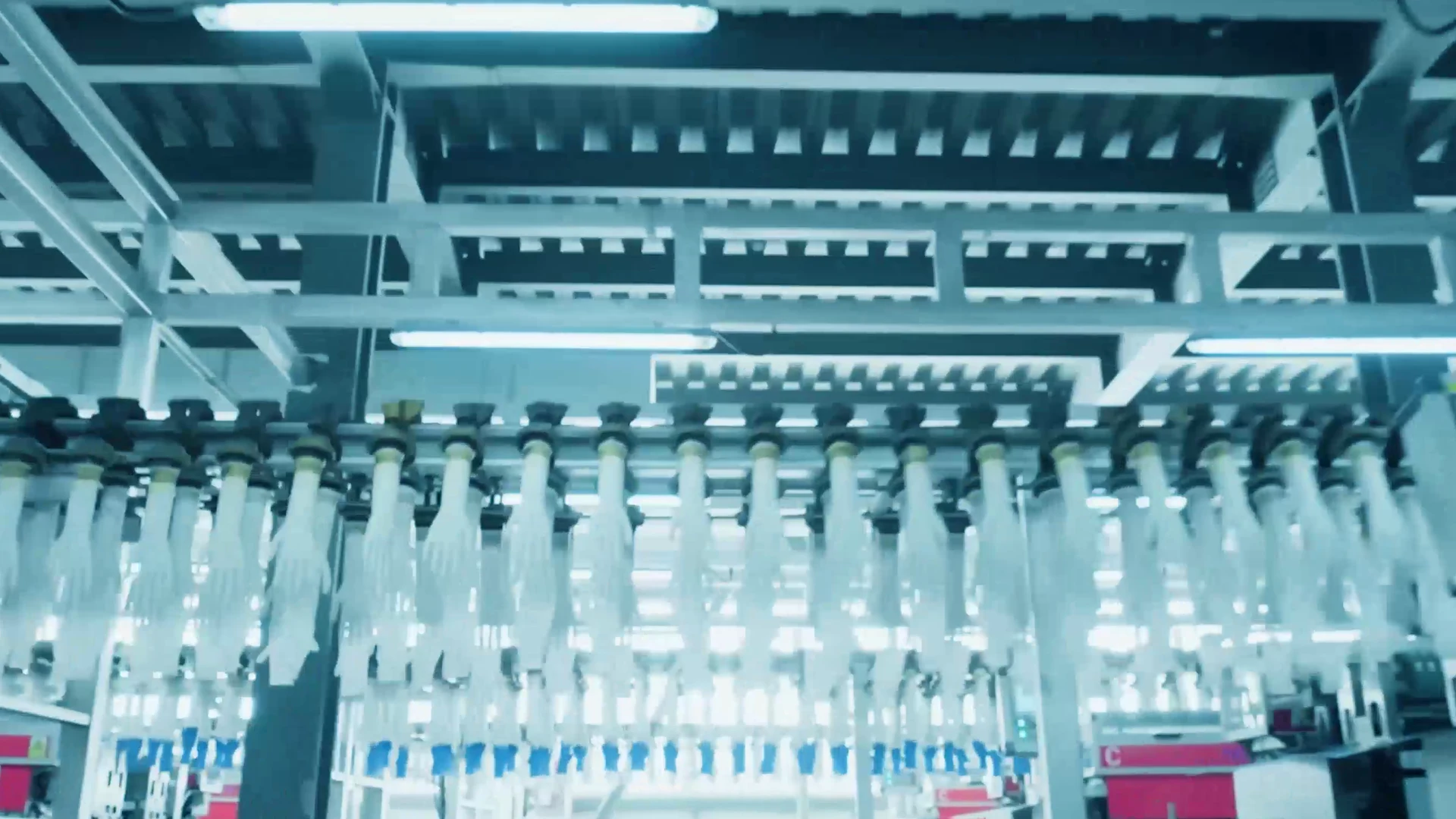 Disposable glove formers and production equipment at a manufacturing partner facility